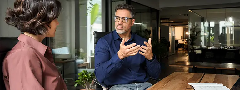 Business Estate Planning for Business Owners two people discussing a will